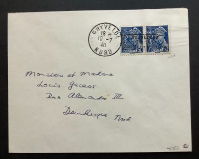 an old envelope with a stamp and a stamp on it