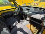 a yellow taxi cab in the back of a car
