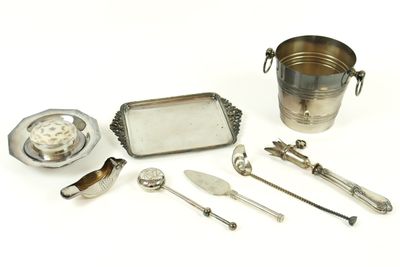 several silverware items including a silver tray, spoons and a silver plate