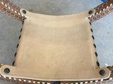 a chair that is sitting on a concrete floor