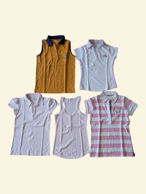 four different types of women ' s polo shirts arranged in a row