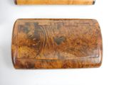two wooden cases that are sitting next to each other
