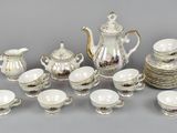 many different types of tea and coffee cups and saucers