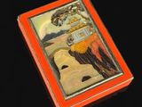 une boîte rouge sur laquelle figure l'image d'un homme et d'une femme