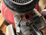 a small engine that is sitting on top of a pallet