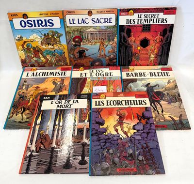six children ' s books in french and english are on a white surface
