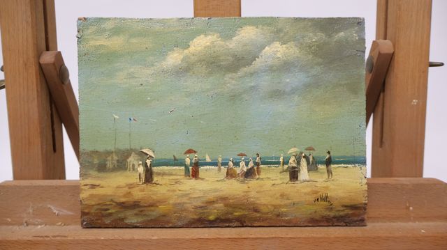 DE VILLIERS (XXème) « Scène de plage animée ». Huile sur panneau....