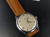 an image of a wrist watch with a brown leather strap