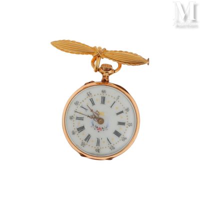 une montre de poche en or ornée d'un oiseau
