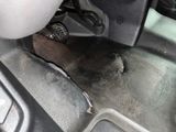 a close up of a car ' s dashboard with a steering wheel
