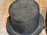 two hats sitting on top of each other on the floor
