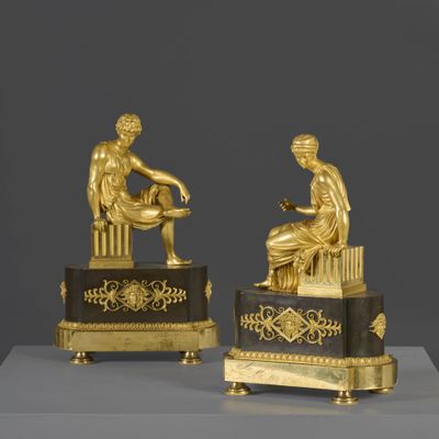 paire de figurines en bronze doré représentant une femme et un homme