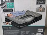 the box is open to show the inside of the bed