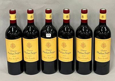 six bouteilles de vin rouge alignées sur une table