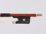 an image of a violin bow with a wooden handle on a white background