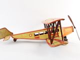 a small model of a small plane on a white surface
