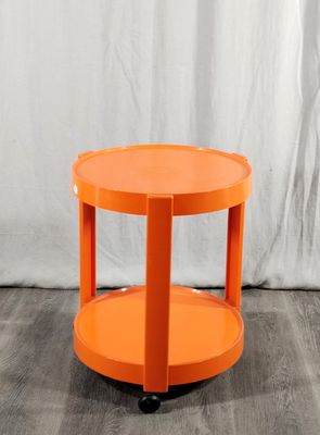 Sellette à roulette en plastique orange à deux plateaux circ…