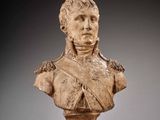 a close up of a bust of a woman on a pedestal
