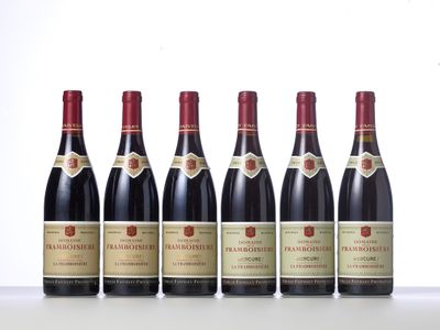 six bottles of red wine lined up in a row