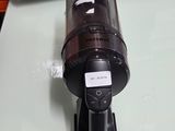 a black blender sitting on a counter next to a box
