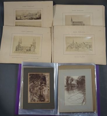 four old photographs of a church and other buildings are on a table