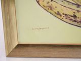 a picture of a painting of a banana on the wall