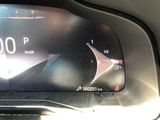 a car dashboard with a digital speedometer on it