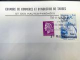 an envelope with a stamp on it that has a picture of a woman on it