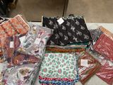 many different types of cloths on a table