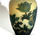 a vase that has a picture of a flower on it
