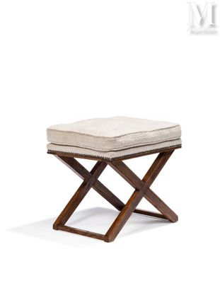 an image of a small stool with a cushion on it