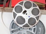 a reel of film sitting on top of a table