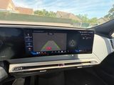 the dashboard of a car with a gps device in it