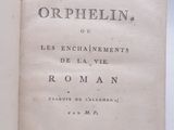 an open book with a black and white title on it