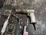 a lot of tools that are sitting on the floor