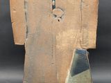 an image of a clay sculpture of a man ' s shirt