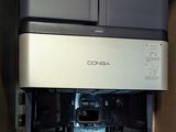 an image of a printer in a box with the lid open