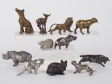 a lot of figurines of different animals on display