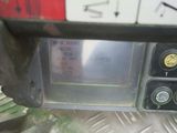 a close up of a parking meter on a metal surface