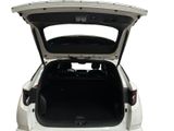 the back of a white car with its trunk open on a white background
