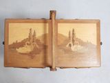 a wooden box with a picture of swans on it