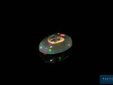 an image of a black background with a glowing object in the middle of the image