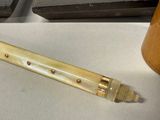 a picture of a pen with a hole in the middle of it