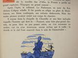 an open book with a picture of a man on a boat