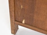 a close up of a wooden cabinet with a white background