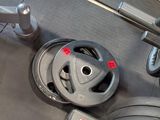 a machine that is sitting on the floor in the gym