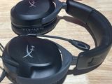 a pair of headphones sitting on a table next to a box