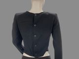 an image of a mannequin wearing a black jacket and skirt