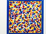 a painting of colorful paint splattered on a white wall