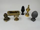 four different types of door handles and knobs on the table
